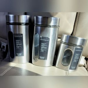 3 clear glass Canister